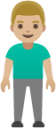 man standing: medium-light skin tone emoji