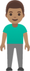 man standing: medium skin tone emoji