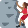 woman climbing: medium-dark skin tone emoji