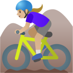 woman mountain biking: medium-light skin tone emoji