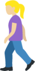 woman walking: medium-light skin tone emoji